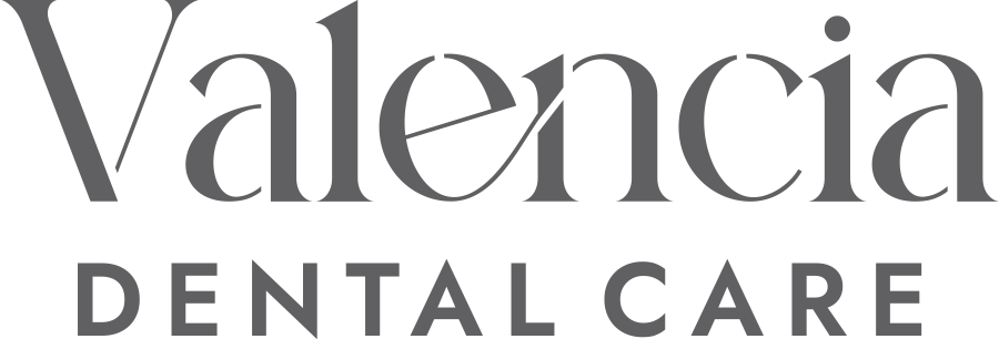 Valencia dental Care logo